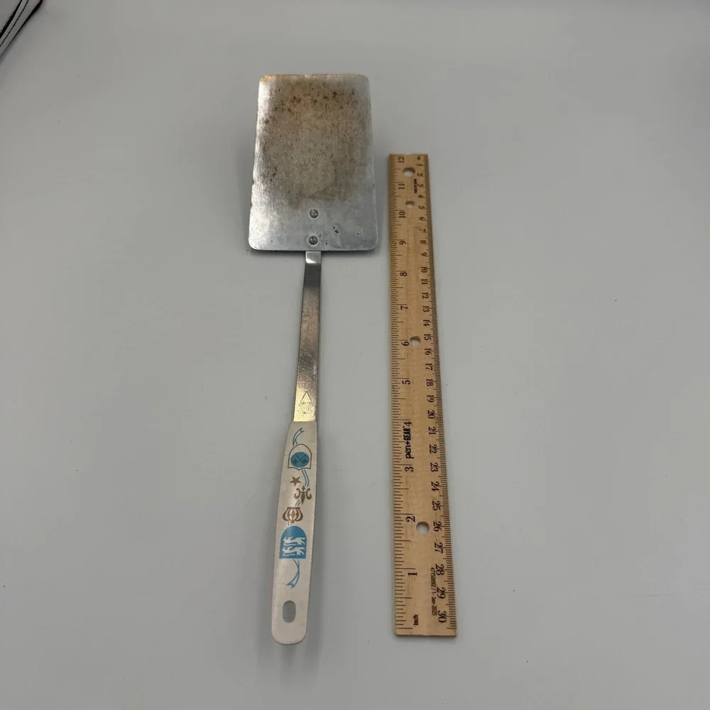 Vintage Household Japan Deluxe Spatula Heraldic Crest White Handle Stainless